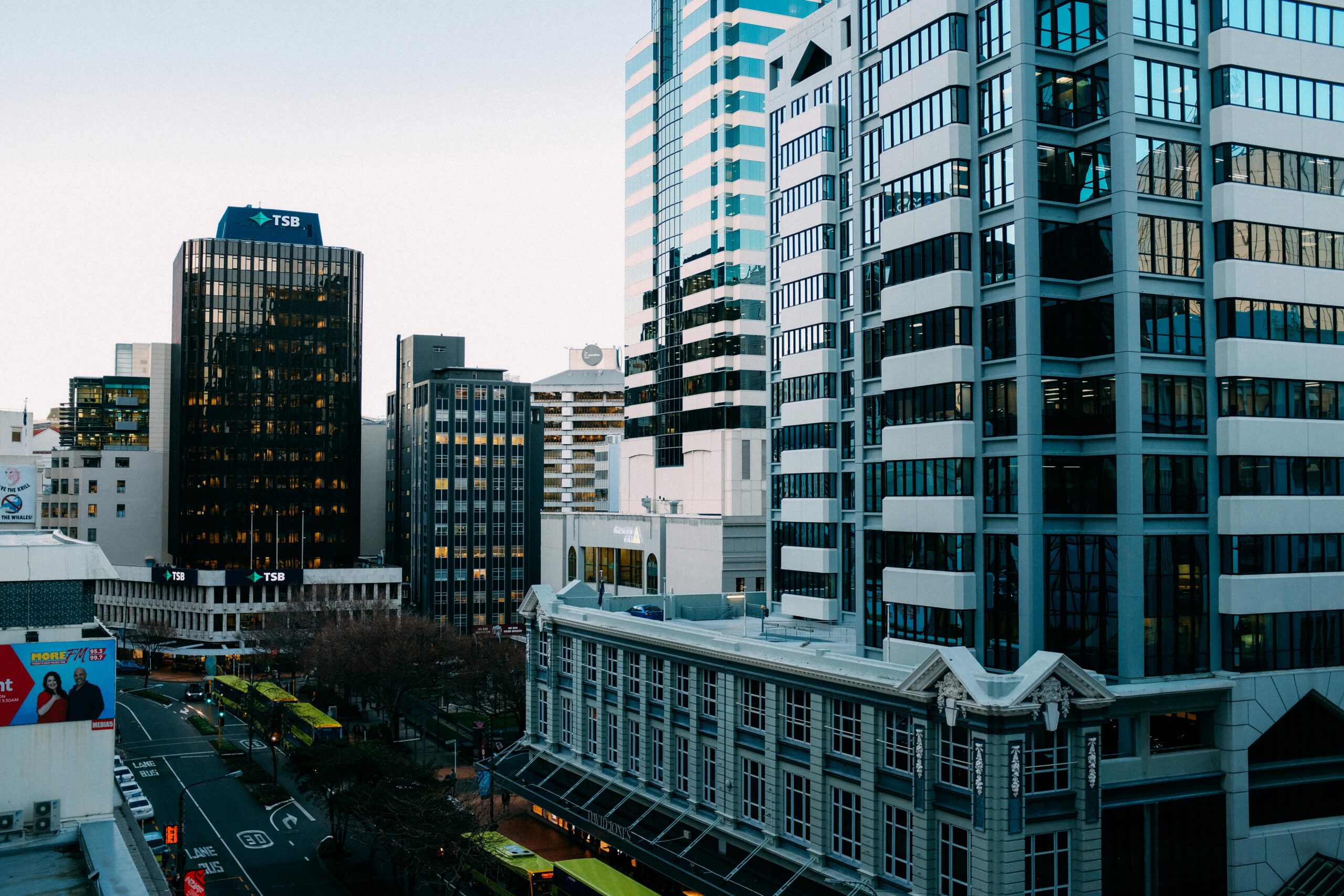 Photo by Adrien Olichon: https://www.pexels.com/photo/buses-on-road-near-high-rise-buildings-3709402/